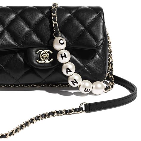 chanel purse pearls|chanel bag with pearls strap.